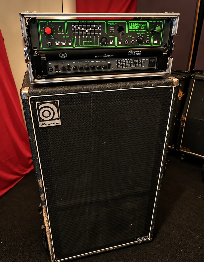 Bass rig: Trace Elliot preamp and Ampeg SVT-3 Pro over an Ampeg cabinet.