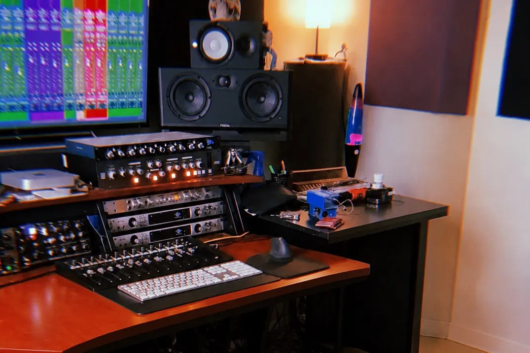 Control room: monitors, converters and outboard gear at the desk.