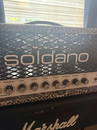 Soldano SLO-100 into a Marshall 1960A cabinet with Celestion Greenback speakers